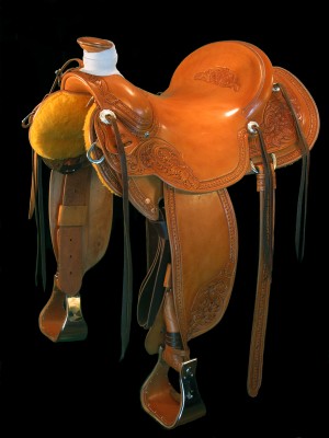 Custom saddle by Cary Schwarz to be given at Wagonhound Production Sale